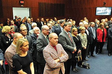 A crowd gathered for the Hon. David G. Larimer's portrait unveiling and Annual Holiday Celebration. Vasiliy Baziuk 