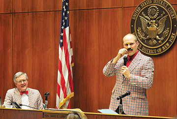 The Hon. David G. Larimer watches his son, John Larimer, deliver remarks. Vasiliy Baziuk 