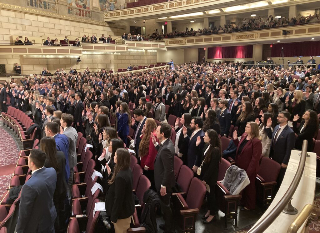 About 220 new attorneys were sworn in on Wednesday at the Eastman Theatre. The keynote speaker was Justice Amy C. Martoche, administrative judge for the Eighth Judicial District. (Photo by Bennett Loudon)